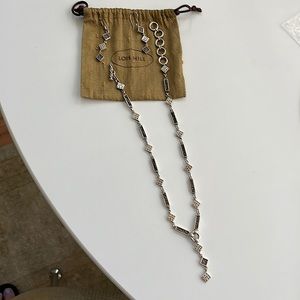 Lois Hill Necklace and earrings in the signature scroll sterling silver.